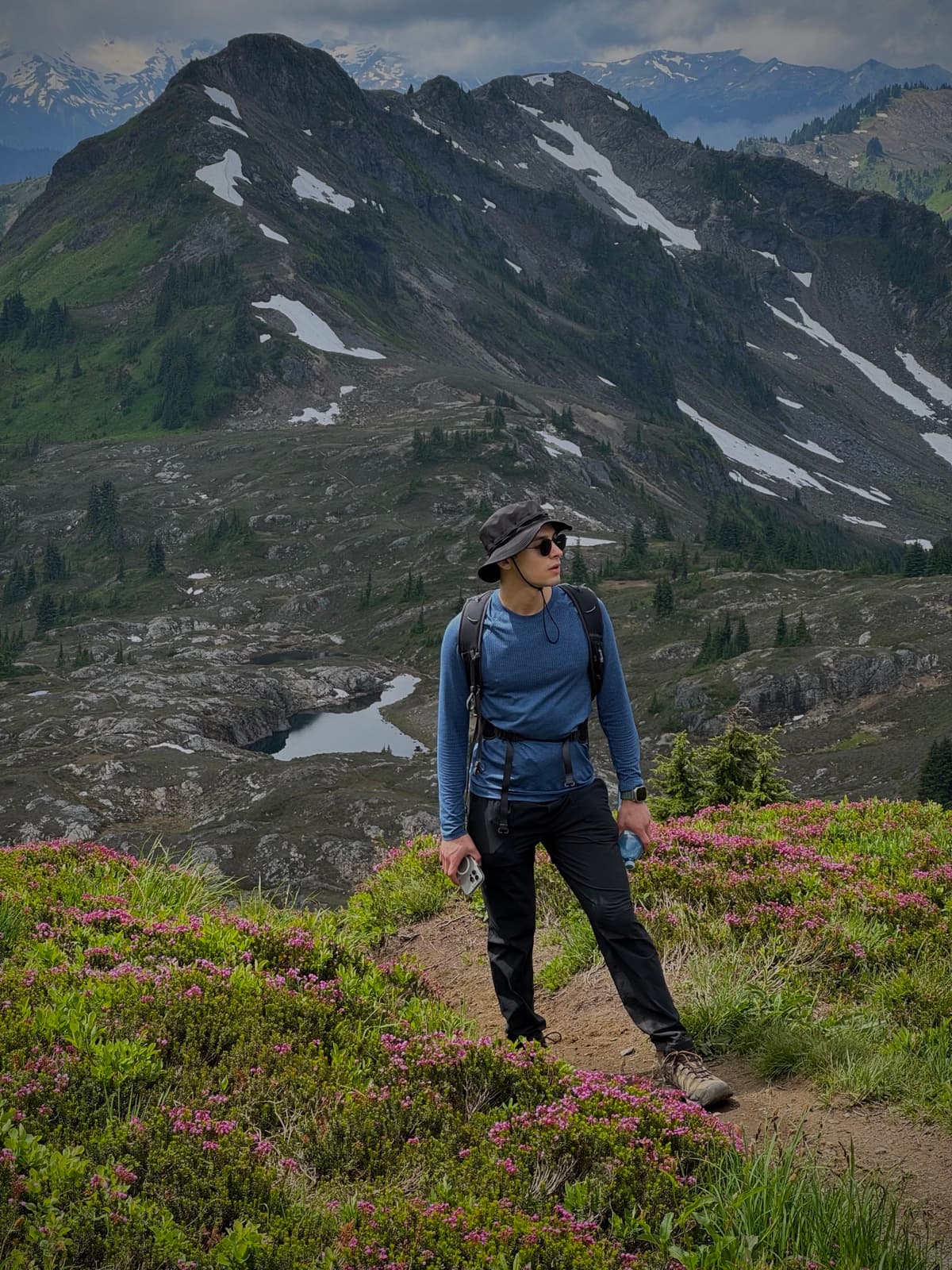 Ben hiking an alpine trail